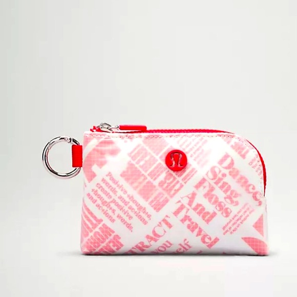 BNWT Lululemon Clippable Card Pouch Manifesto Print in White/Lulu Red - Picture 1 of 11